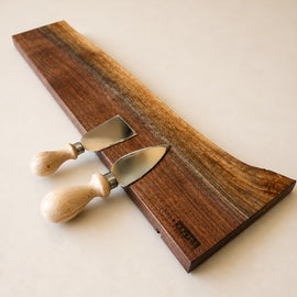 18 inch walnut magnetic knife holder with knives mounted on wall