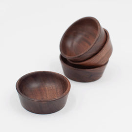 2-inch walnut wood small condiment cup with rich natural grain, shown stacked and individually on a white background.