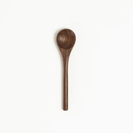4 inch walnut wood tiny spoon on white background, small wooden spoon for salt jars and condiments.