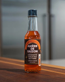 Amère de Saizon aromatic cocktail bitters in a 5 oz bottle, handcrafted small-batch bitters from Louisiana.
