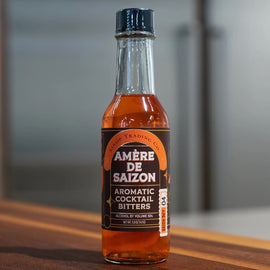 Amère de Saizon aromatic cocktail bitters in a 5 oz bottle, handcrafted small-batch bitters from Louisiana.