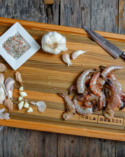 Atchafalaya Board – handcrafted Sinker Cypress cutting board with juice well, made in New Orleans and inspired by the Atchafalaya Basin swamp

