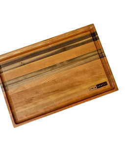 Handcrafted cherry wood Big Easy cutting board