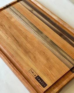 Handcrafted cherry wood Big Easy cutting board