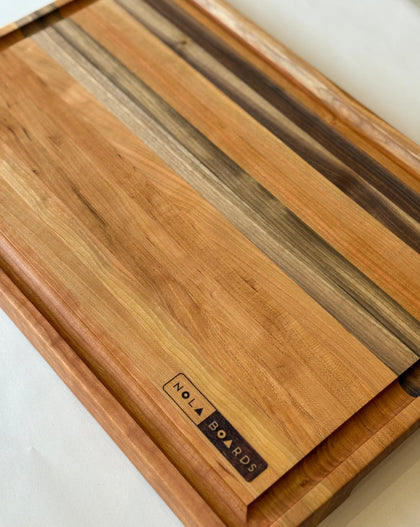 Handcrafted cherry wood Big Easy cutting board