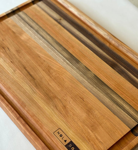 Handcrafted cherry wood Big Easy cutting board