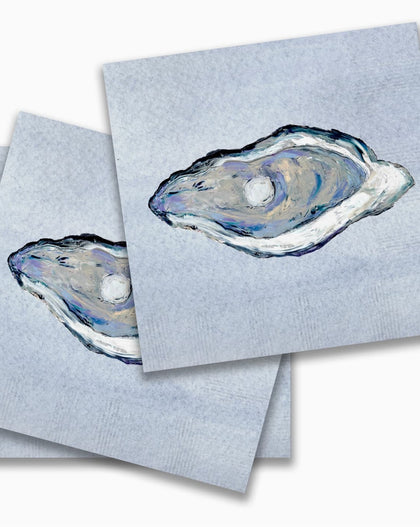 Blue cocktail napkins with hand-painted oyster illustration in soft coastal tones.