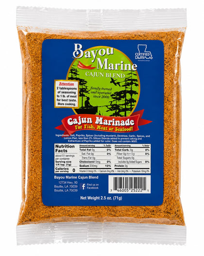 A 2.5 oz bag of Bayou Marine Cajun Marinade, featuring a clear plastic bag filled with orange-brown seasoned marinade and a large blue label with product details.