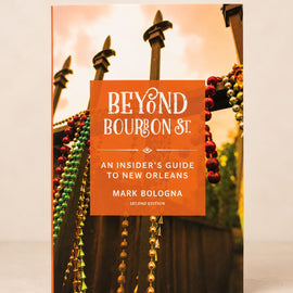 The book cover of 'Beyond Bourbon St.: An Insider's Guide to New Orleans' by Mark Bologna, shown standing upright against a light beige background.