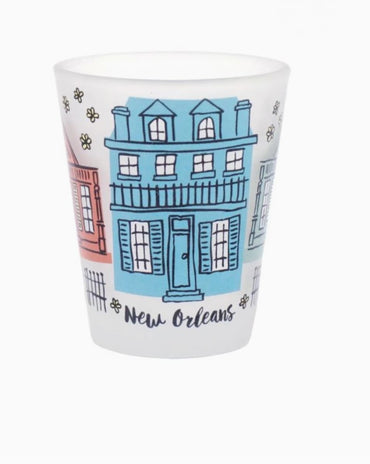 Frosted shot glass with vibrant New Orleans Creole Cottages artwork featuring colorful houses and Crescent City charm.