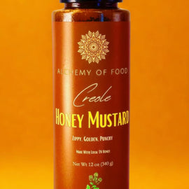 Bottle of Creole Honey Mustard made with local Tennessee honey, small-batch sweet and tangy mustard sauce.