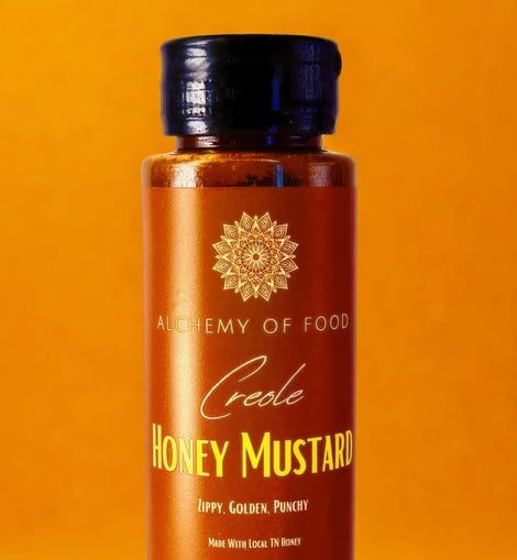 Bottle of Creole Honey Mustard made with local Tennessee honey, small-batch sweet and tangy mustard sauce.