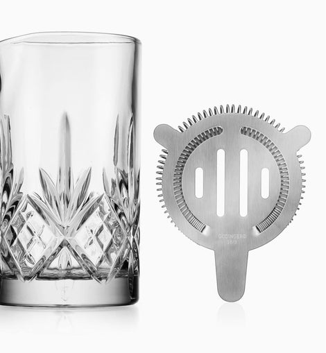 Close-up of crystal mixing pitcher and strainer