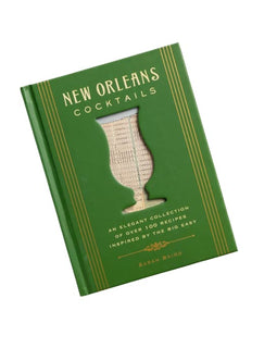 New Orleans Cocktails book by Sarah Baird – green hardcover with gold accents and a cutout Hurricane glass design on the cover.