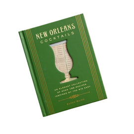New Orleans Cocktails book by Sarah Baird – green hardcover with gold accents and a cutout Hurricane glass design on the cover.