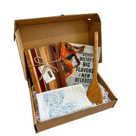 New Orleans Cooking Gift Box with Petit Fromage Board, Louisiana Tea Towel, 12" Roux Spoon, and Kevin Belton’s Big Flavors of New Orleans Cookbook.