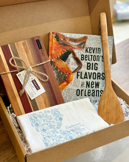 New Orleans Cooking Gift Box with Petit Fromage Board, Louisiana Tea Towel, 12" Roux Spoon, and Kevin Belton’s Big Flavors of New Orleans Cookbook.