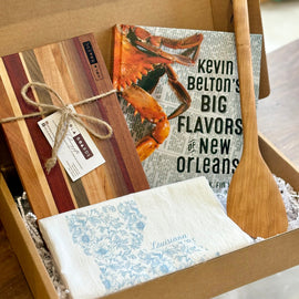 New Orleans Cooking Gift Box with Petit Fromage Board, Louisiana Tea Towel, 12" Roux Spoon, and Kevin Belton’s Big Flavors of New Orleans Cookbook.