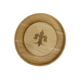 12-inch round wooden Nola Nibbler board with engraved fleur-de-lis and built-in cracker groove.