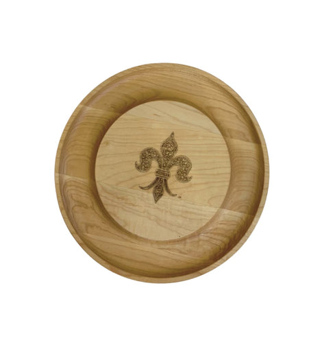 12-inch round wooden Nola Nibbler board with engraved fleur-de-lis and built-in cracker groove.
