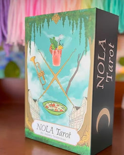 New Orleans–themed tarot cards including The Fool, King of Pentacles, and Two of Swords with colorful city-inspired illustrations.