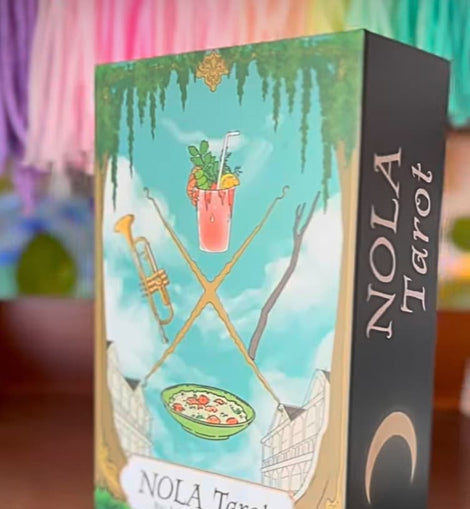 New Orleans–themed tarot cards including The Fool, King of Pentacles, and Two of Swords with colorful city-inspired illustrations.