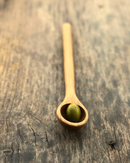 Handcrafted wood olive spoon with drip hole for serving olives