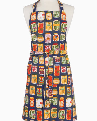 Pickling chef apron featuring colorful preserved vegetable jars on navy striped background with adjustable neck strap and long waist ties.