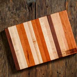 Striped Cherry, Maple, and Walnut cutting board.