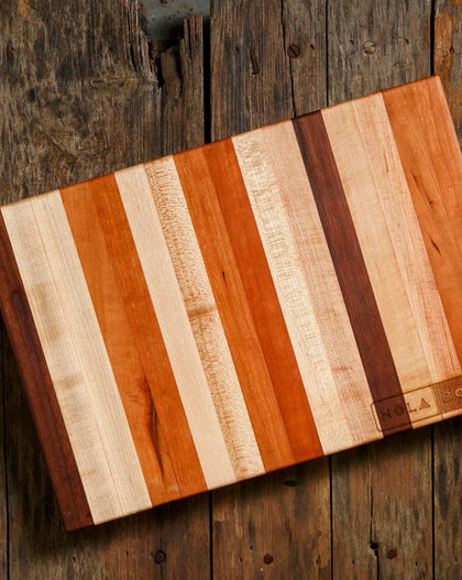 Striped Cherry, Maple, and Walnut cutting board.
