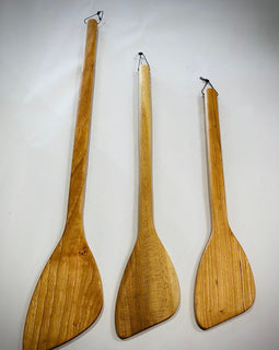 Flat-edged wooden roux spoon with hanging string