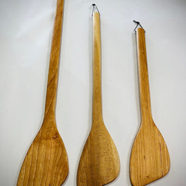Flat-edged wooden roux spoon with hanging string