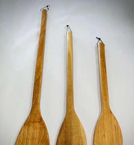 Flat-edged wooden roux spoon with hanging string