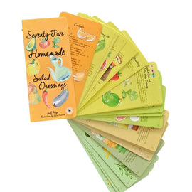 Fan-style flip book of ‘Seventy-Five Homemade Salad Dressings’ opened to show illustrated recipe cards.