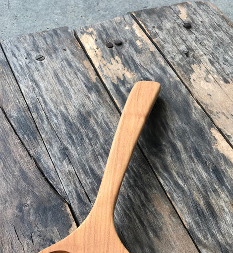Handcrafted wood heart-shaped spoon with hanging string