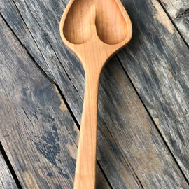 Handcrafted wood heart-shaped spoon with hanging string