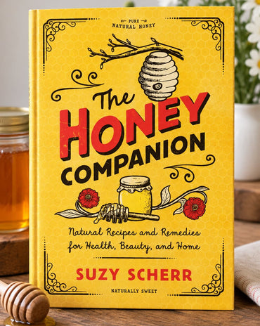 Cover of The Honey Companion by Suzy Scherr, a yellow vintage-inspired book featuring honey illustrations and natural recipes for health, beauty, and home.