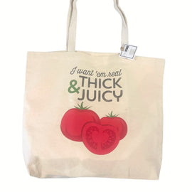 I Want Em Real Thick and Juicy Tomato canvas tote bag with bold red tomato graphic and playful text.