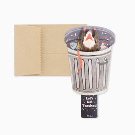 Trash possum mini pop-up greeting card featuring a possum popping out of a trash can with a pull tab that reads “Let’s Get Trashed.”