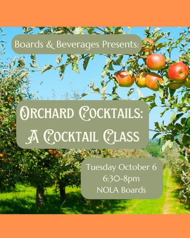 Promotional flyer for 'Orchard Cocktails: A Cocktail Class' presented by Boards & Beverages, featuring a background photo of an apple orchard with ripe red apples on the trees, framed by orange borders with text boxes detailing the event date, time, and location at NOLA Boards.