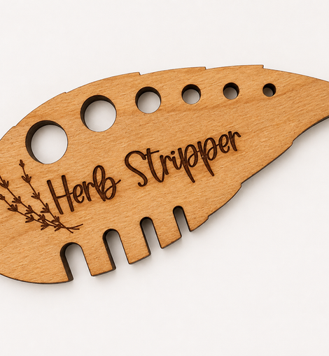 A light natural wood herb stripper tool with laser-engraved text and a small leaf illustration, shown on a plain white background.