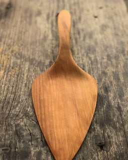 Handcrafted wooden pizza and pie server with hanging string