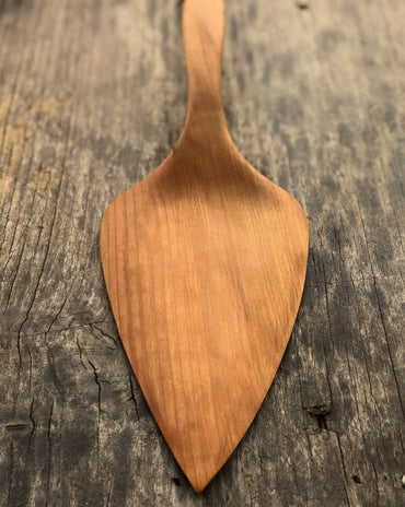 Handcrafted wooden pizza and pie server with hanging string