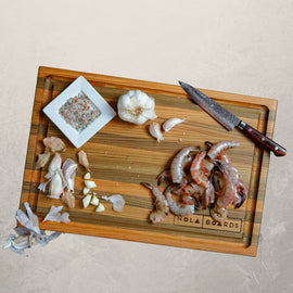 Atchafalaya Louisiana Sinker Cypress cutting board with juice groove, handcrafted in New Orleans with unique grain and dual-sided design