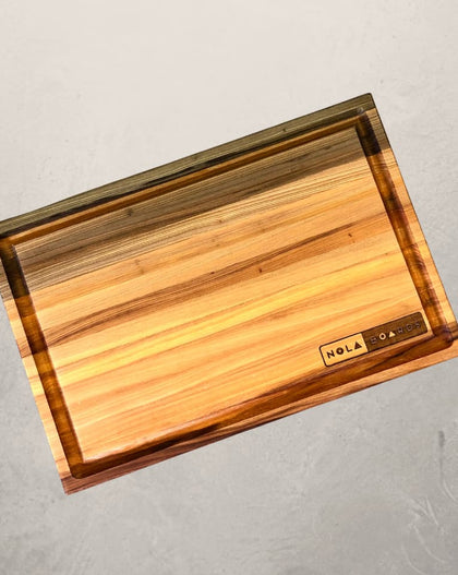 Atchafalaya Louisiana Sinker Cypress cutting board with juice groove, handcrafted in New Orleans with unique grain and dual-sided design