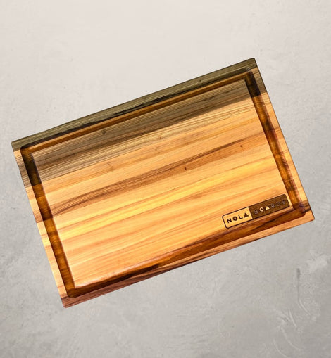 Atchafalaya Louisiana Sinker Cypress cutting board with juice groove, handcrafted in New Orleans with unique grain and dual-sided design