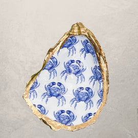 oyster shell trinket dish with blue crab pattern and gold edge