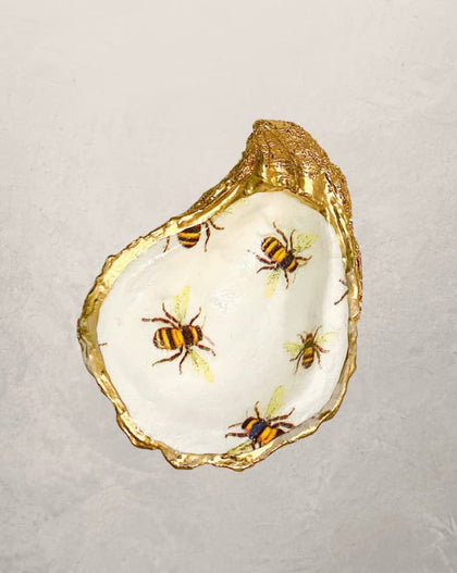 oyster shell trinket dish with bee design and gold edge