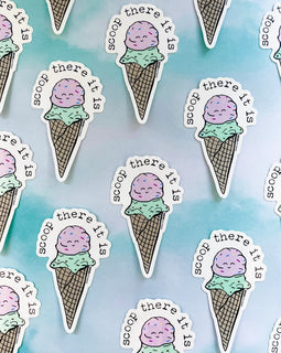 Vinyl sticker with hand-lettered text reading “Scoop There It Is” in playful ice cream-themed style