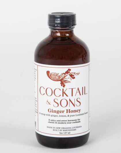 Cocktail and Sons ginger honey syrup bottle made in New Orleans, cocktail mixer with ginger, lemon, and Louisiana honey